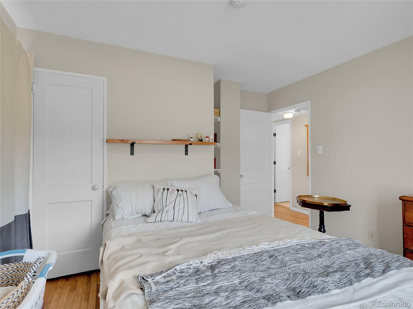 660 West Spruce Street Nederland, CO 80466 - Photo 20 of 29 a bedroom with a bed and a dresser in it