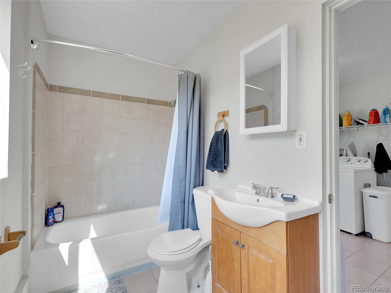 660 West Spruce Street Nederland, CO 80466 - Photo 25 of 29 a bathroom with a sink toilet and shower