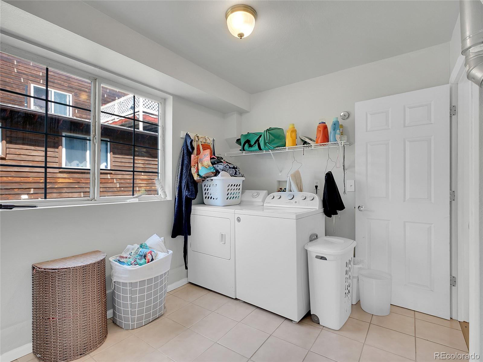 660 West Spruce Street Nederland, CO 80466 - Photo 26 of 29 a utility room with dryer and washer