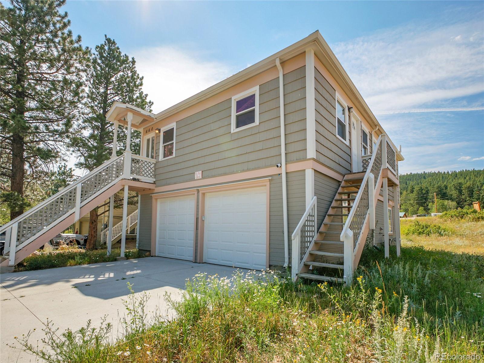 660 West Spruce Street Nederland, CO 80466 - Photo 3 of 29 a view of a house with a yard