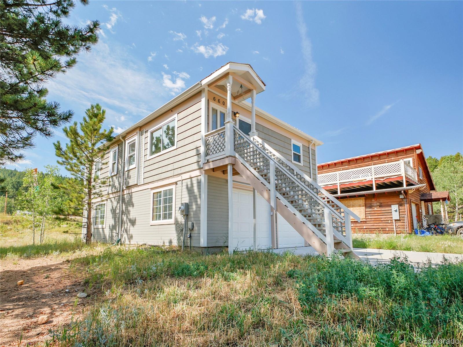 660 West Spruce Street Nederland, CO 80466 - Photo 4 of 29 front view of a house with a yard