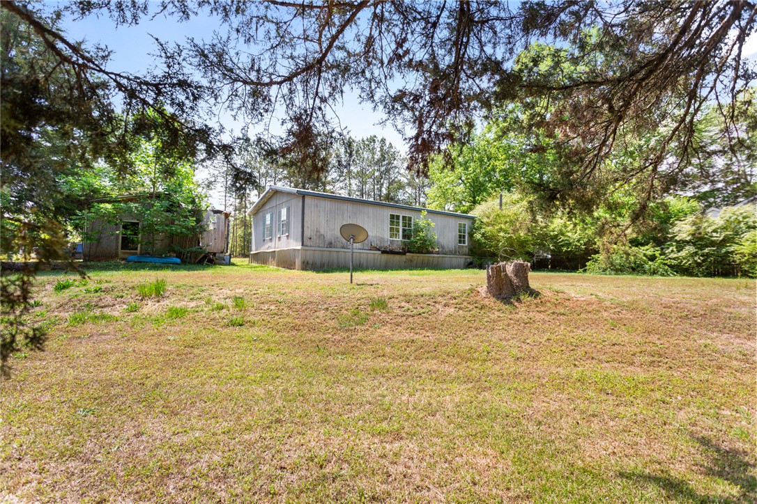 209 Short Cut Road Westminster, SC 29693 - Photo 5 of 27 This expansive lot offers ample space, perfect for outdoor activities or future expansion.