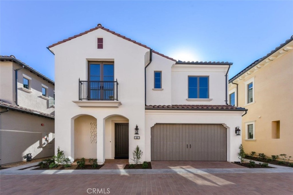a front view of a house with yard