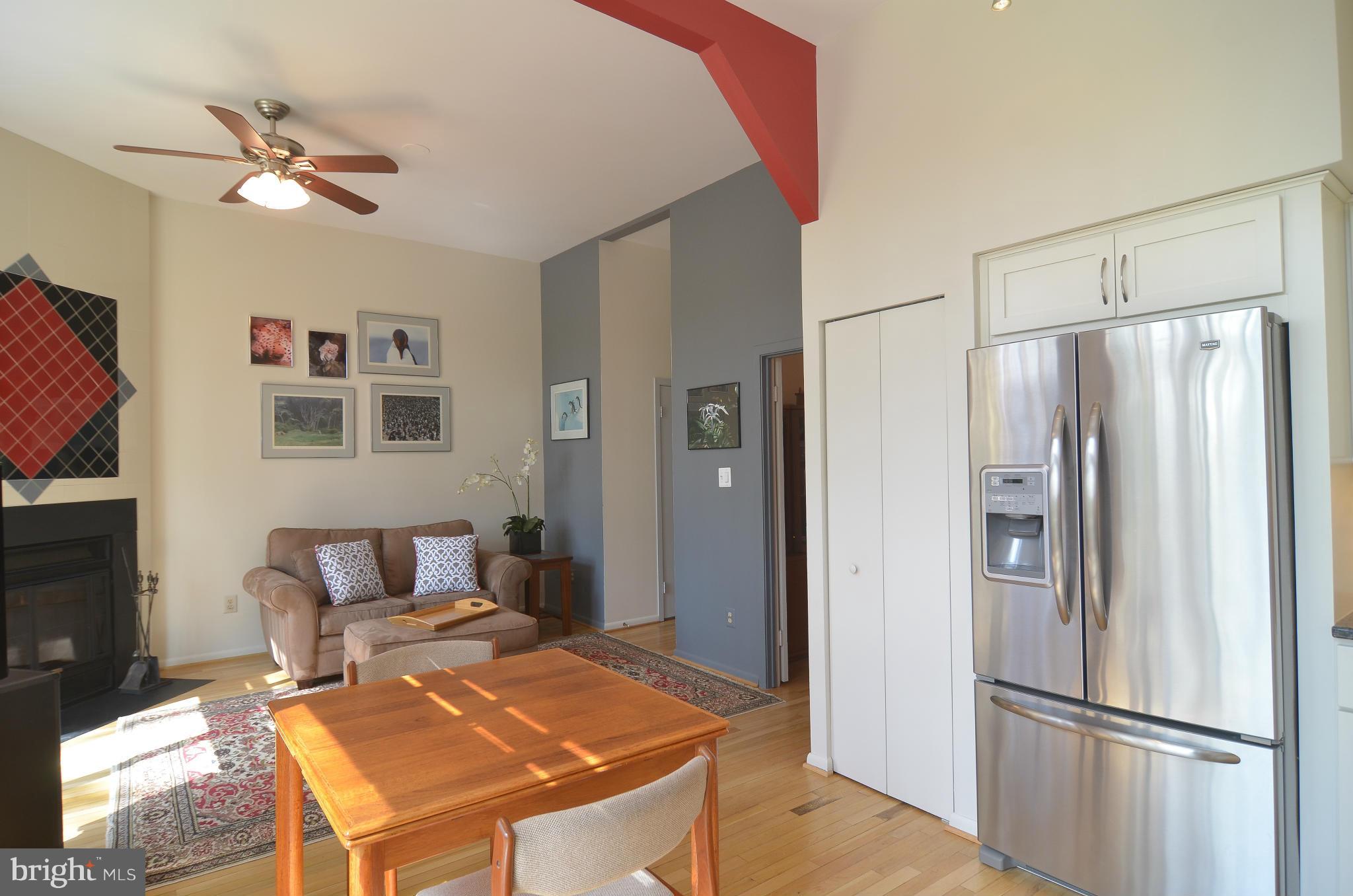 11125 Watermans Drive Reston, VA 20191 - Photo 6 of 26 The kitchen opens to the family room.