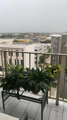 a picture of a table and chairs and potted plants