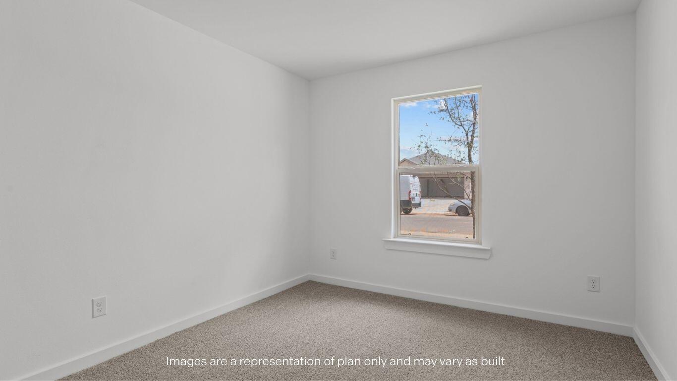 7411 9th Street Lubbock, TX 79416 - Photo 14 of 20 an empty room with a window