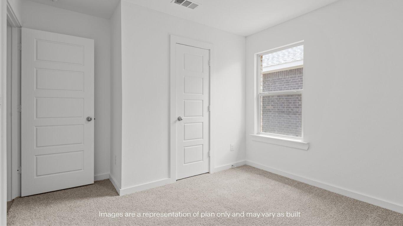 7411 9th Street Lubbock, TX 79416 - Photo 17 of 20 an empty room with windows