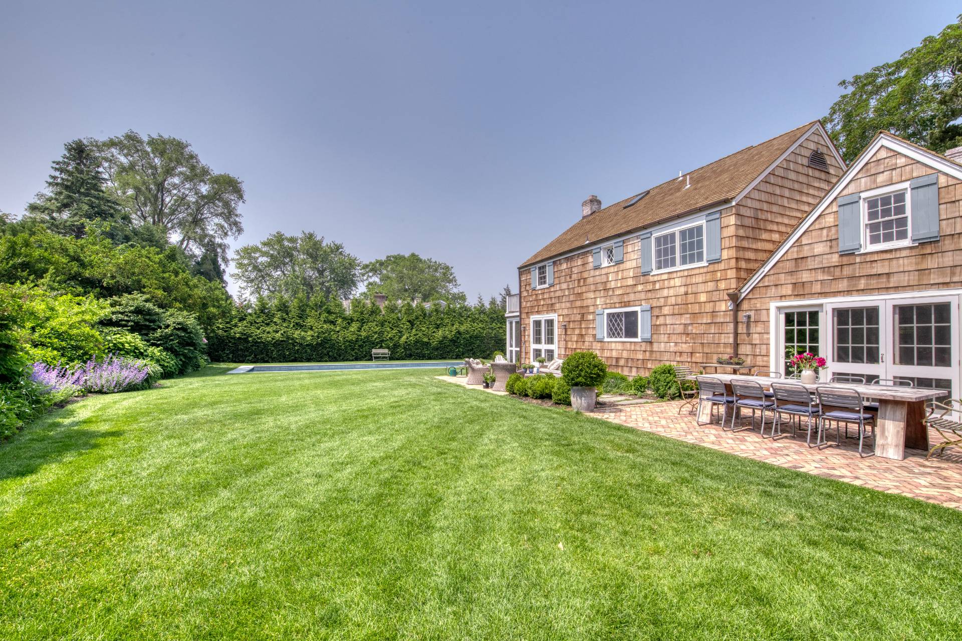 75 Narod Boulevard Water Mill, NY 11976 - Photo 29 of 29 a view of a house with a yard and sitting area