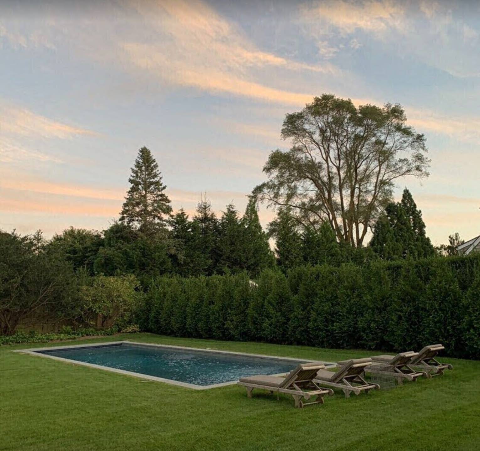 75 Narod Boulevard Water Mill, NY 11976 - Photo 3 of 29 a view of a golf course with a lake