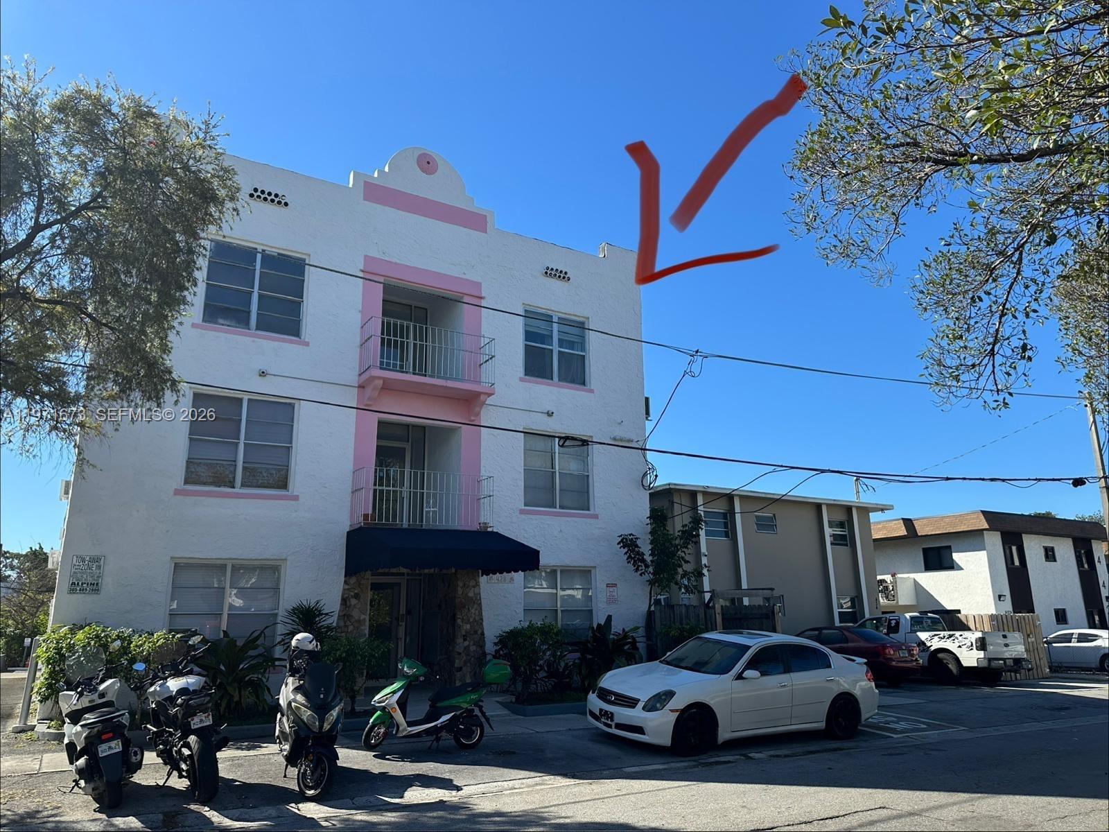 428 Southwest 9th Street, Unit 15 Miami, FL 33130 - Photo 9 of 13 a car parked in front of a building