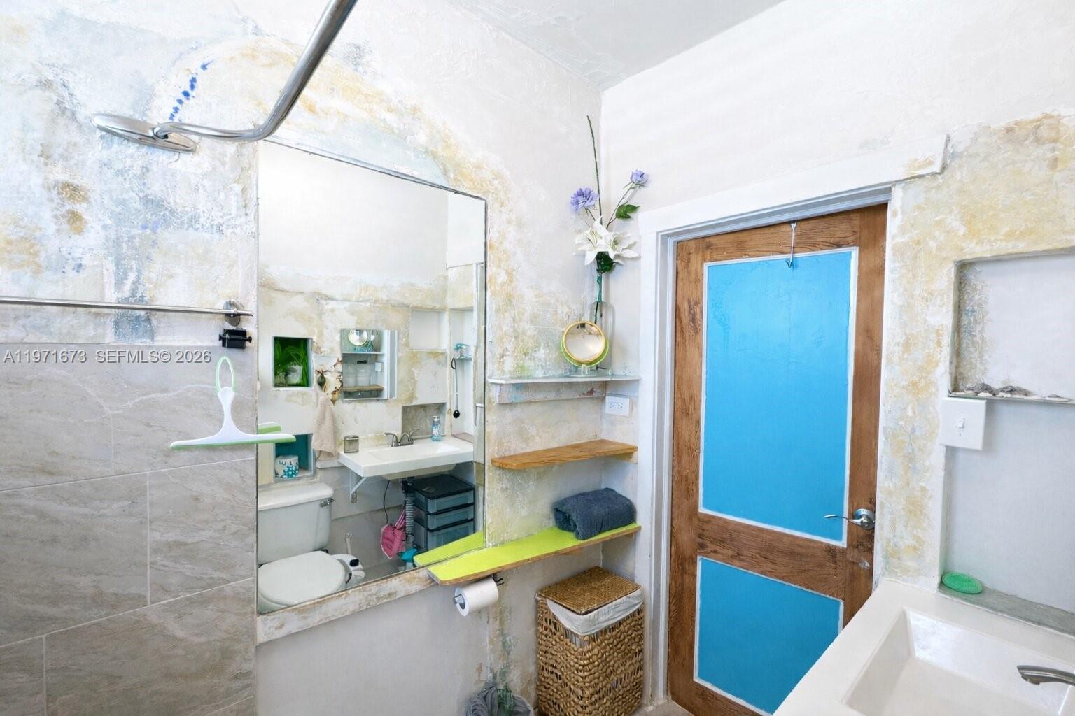 428 Southwest 9th Street, Unit 15 Miami, FL 33130 - Photo 10 of 13 a room with storage and utility