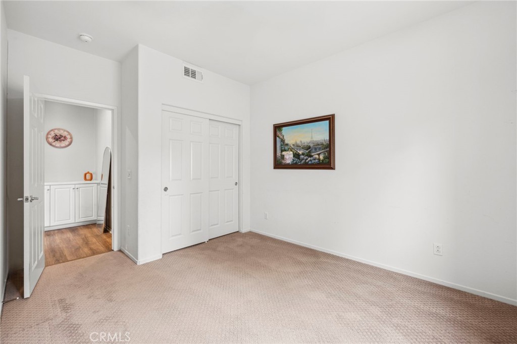 205 Spotted Saddle Way Fallbrook, CA 92028 - Photo 19 of 63 a view of an empty room