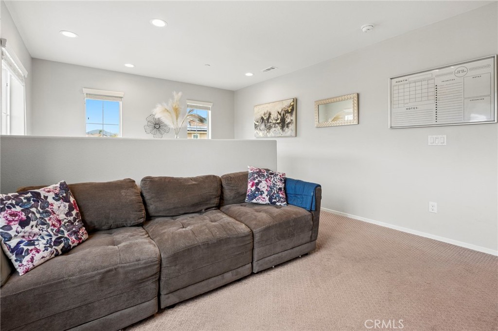 205 Spotted Saddle Way Fallbrook, CA 92028 - Photo 21 of 63 a living room with furniture and a couch