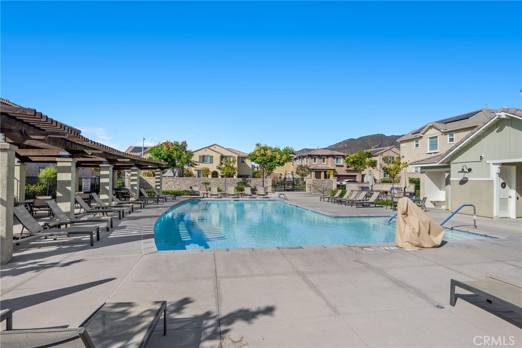 205 Spotted Saddle Way Fallbrook, CA 92028 - Photo 42 of 63 a view of a swimming pool with a patio