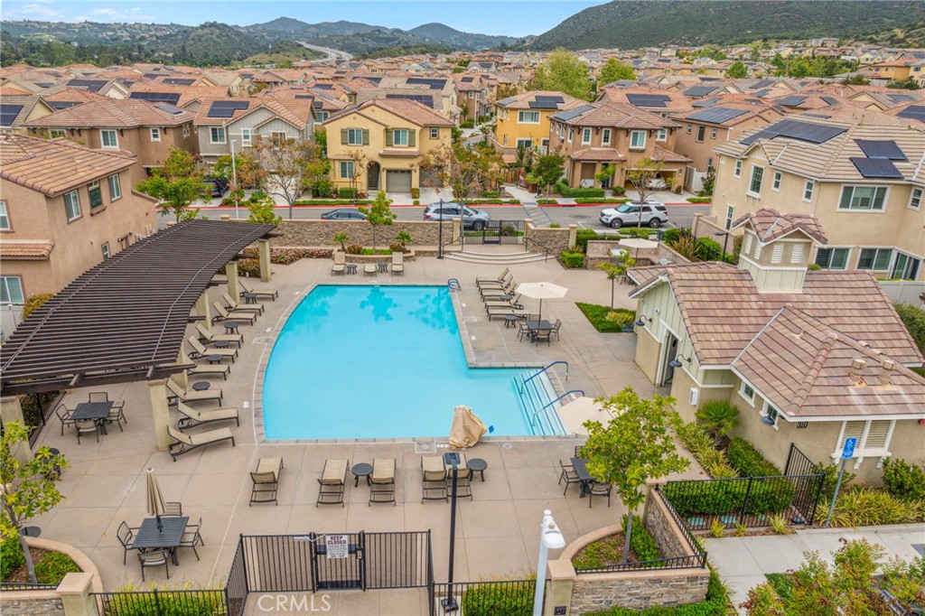 205 Spotted Saddle Way Fallbrook, CA 92028 - Photo 43 of 63 an aerial view of residential houses with outdoor space and parking
