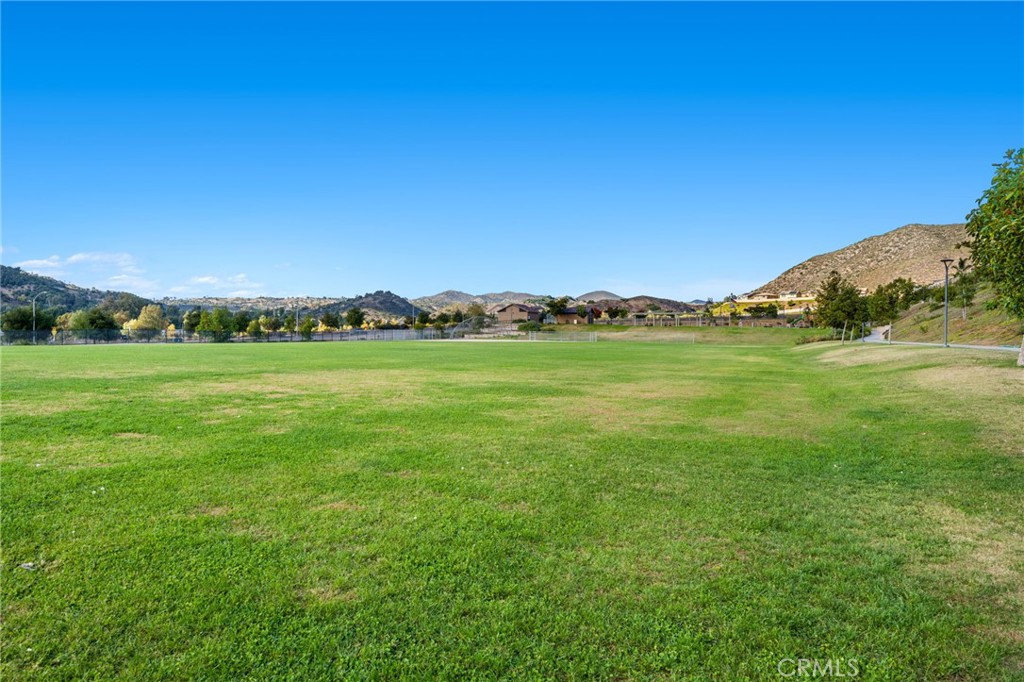 205 Spotted Saddle Way Fallbrook, CA 92028 - Photo 48 of 63 a view of a city with lush green forest