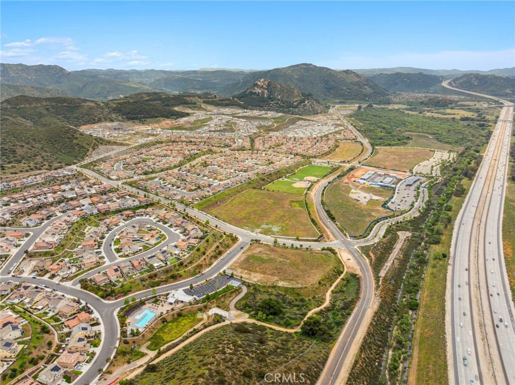 205 Spotted Saddle Way Fallbrook, CA 92028 - Photo 62 of 63 a view of a lake with a mountain