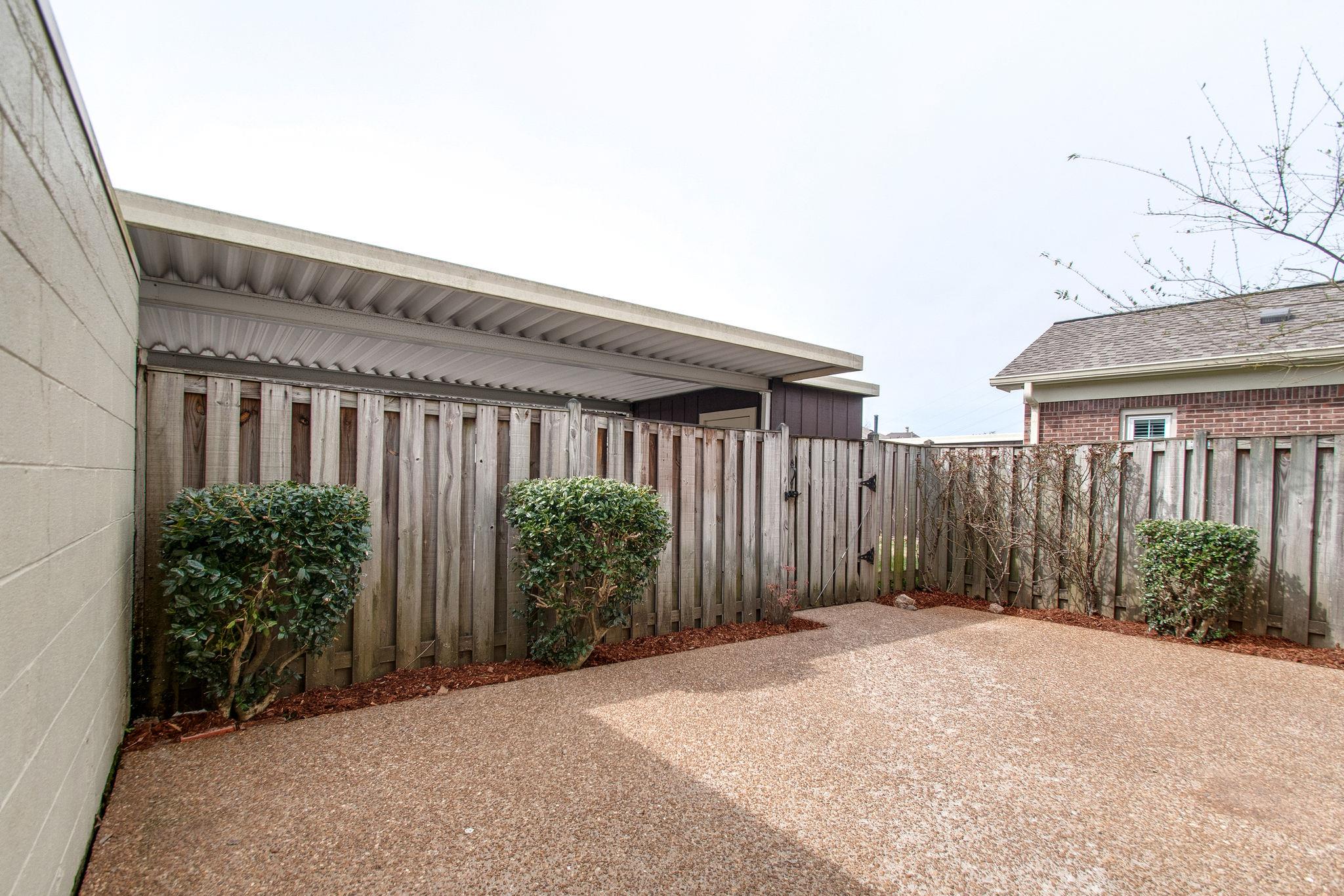 537 General George Patton Road Nashville, TN 37221 - Photo 25 of 29 a view of a house with backyard and plants