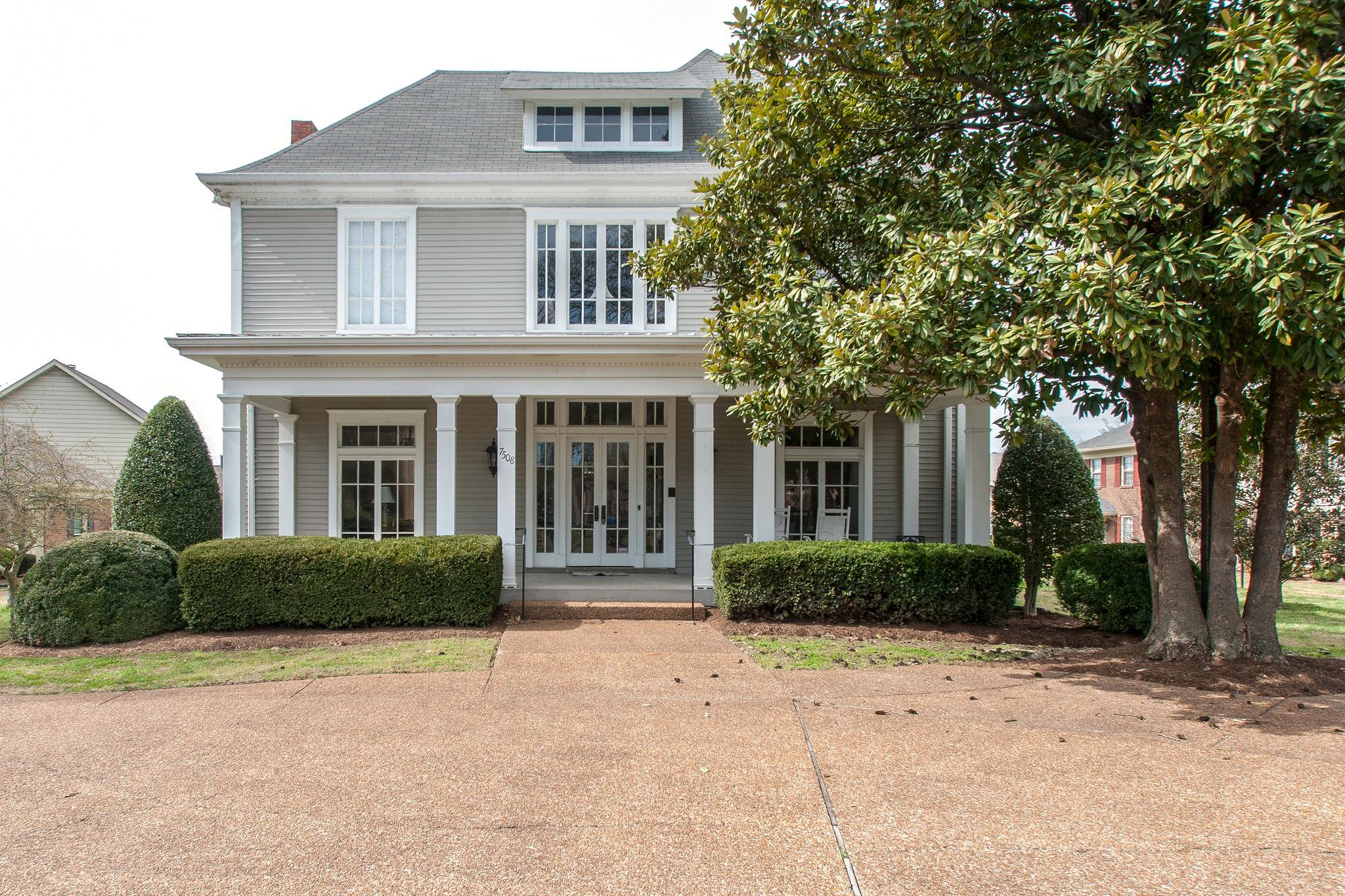 537 General George Patton Road Nashville, TN 37221 - Photo 29 of 29 a front view of a house with a garden