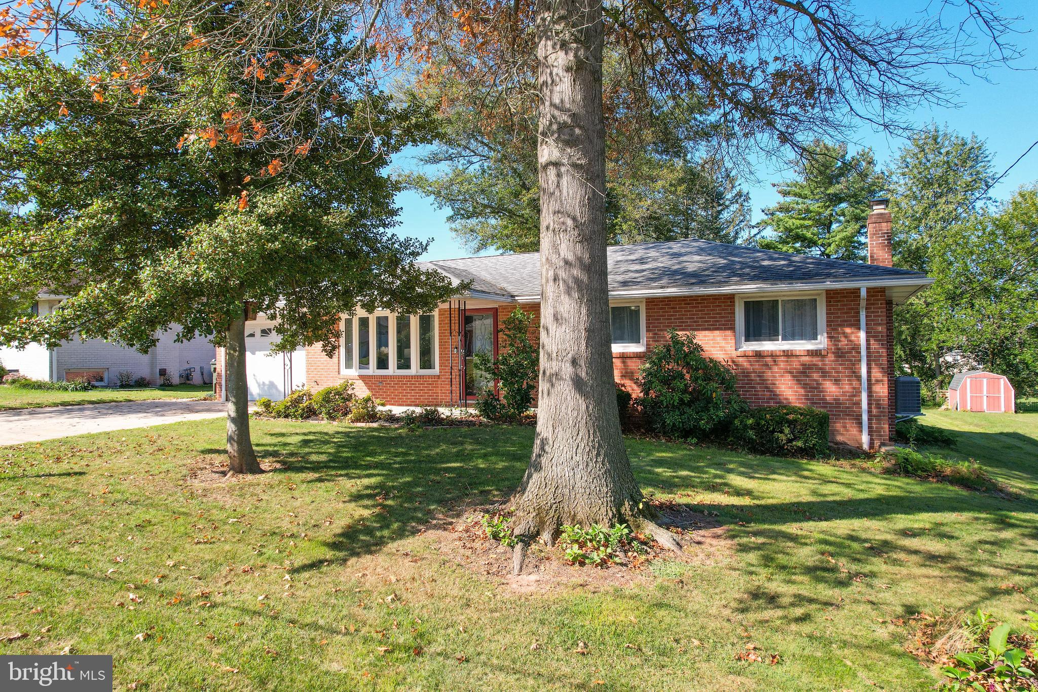 2340 Redwood Road York, PA 17408 - Photo 1 of 68 a view of a house with backyard and tree s