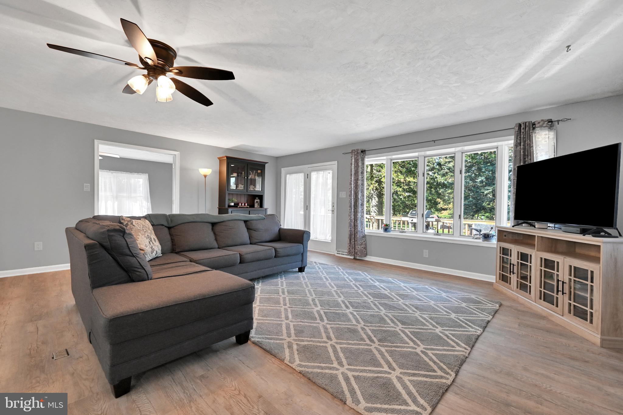 2340 Redwood Road York, PA 17408 - Photo 25 of 68 a living room with furniture and a flat screen tv