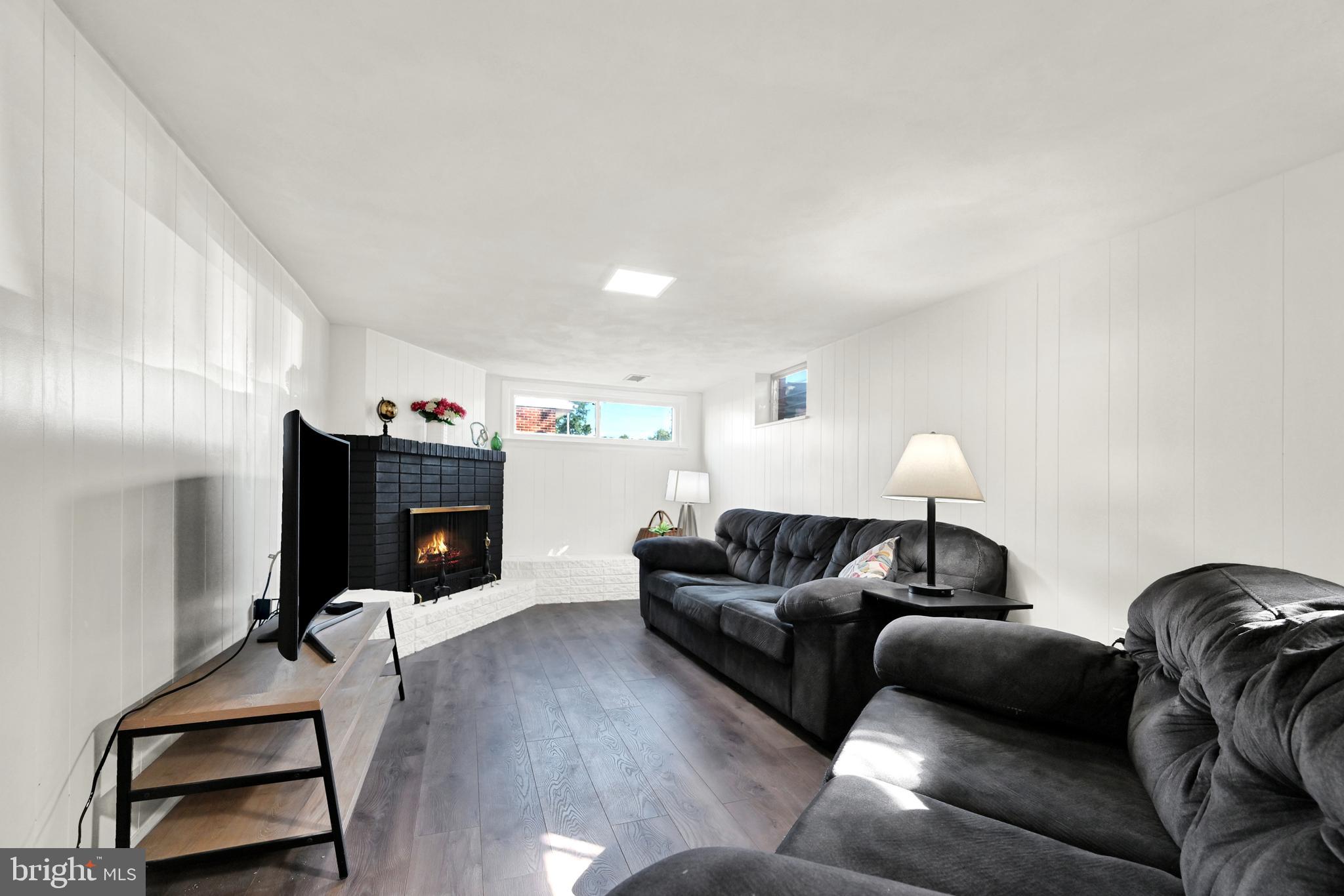 2340 Redwood Road York, PA 17408 - Photo 49 of 68 a living room with furniture and a wooden floor
