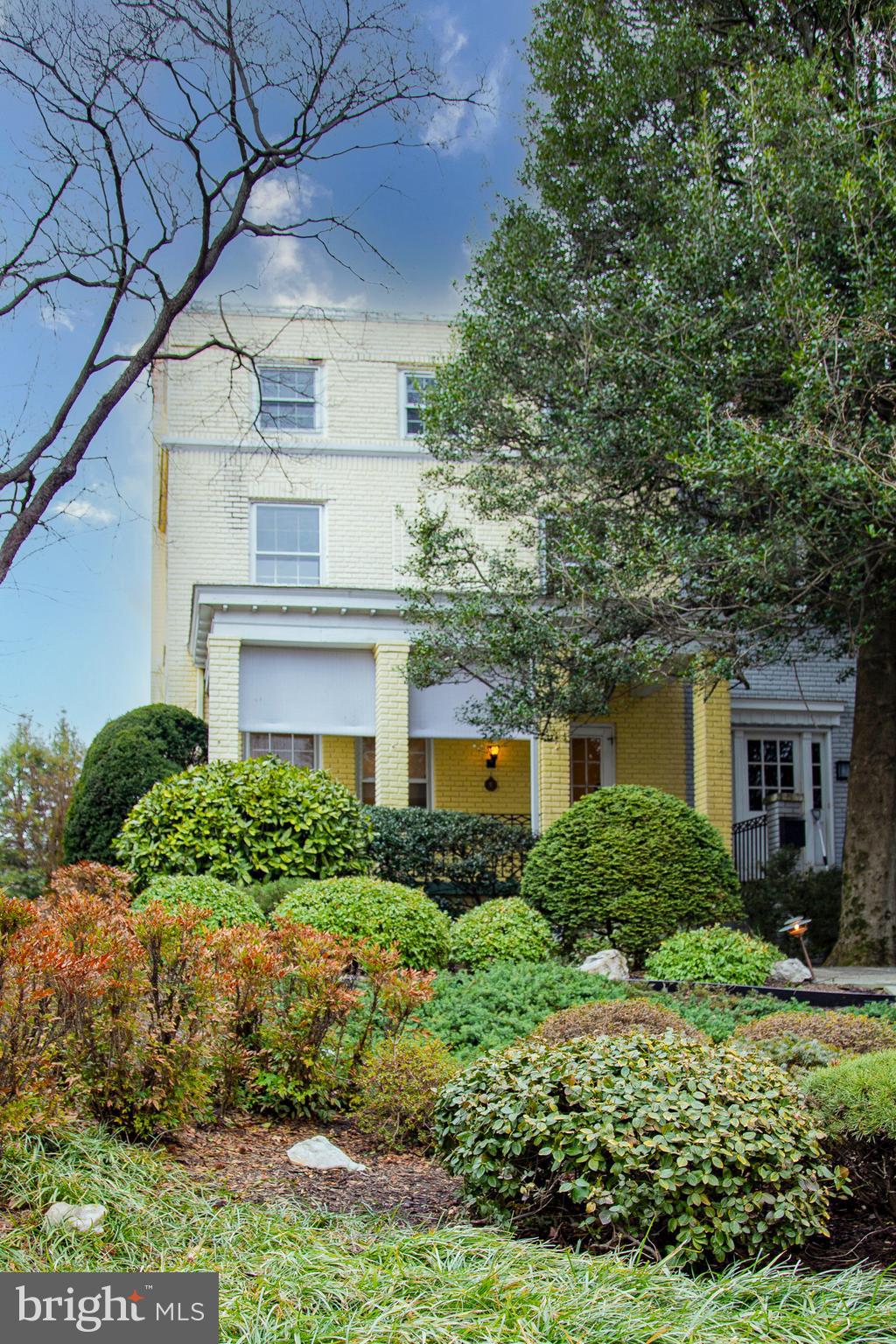 2849 29th Street Northwest Washington, DC 20008 - Photo 2 of 38 a front view of a house with a yard