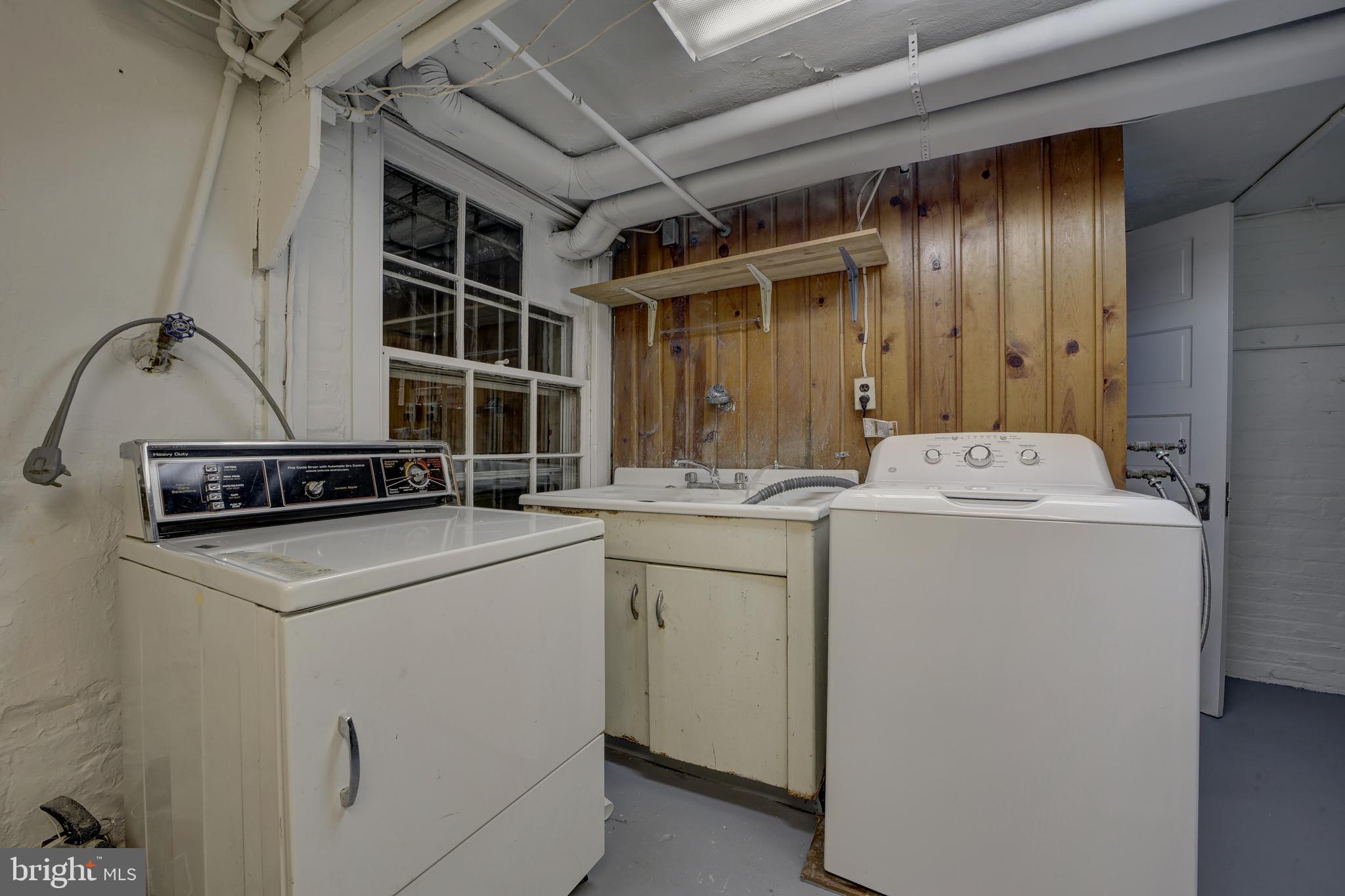 2849 29th Street Northwest Washington, DC 20008 - Photo 32 of 38 a utility room with dryer and washer