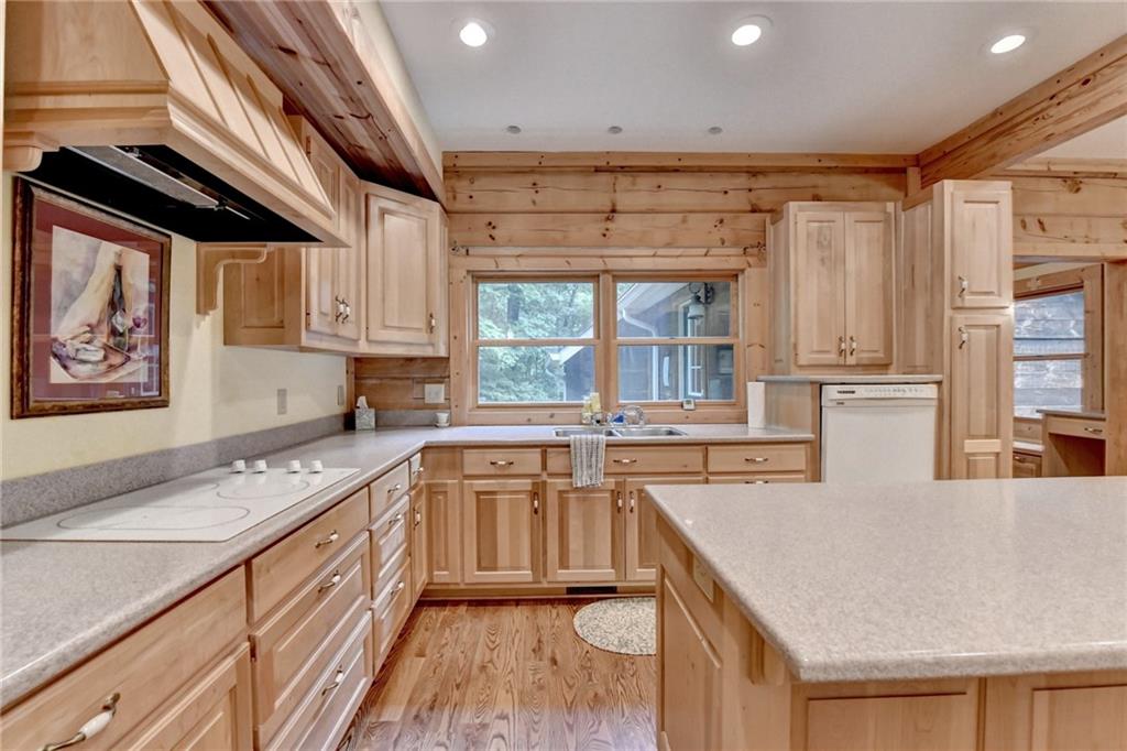 82 Walnut Grove Lane Tiger, GA 30576 - Photo 19 of 88 a kitchen with stainless steel appliances granite countertop a sink and cabinets