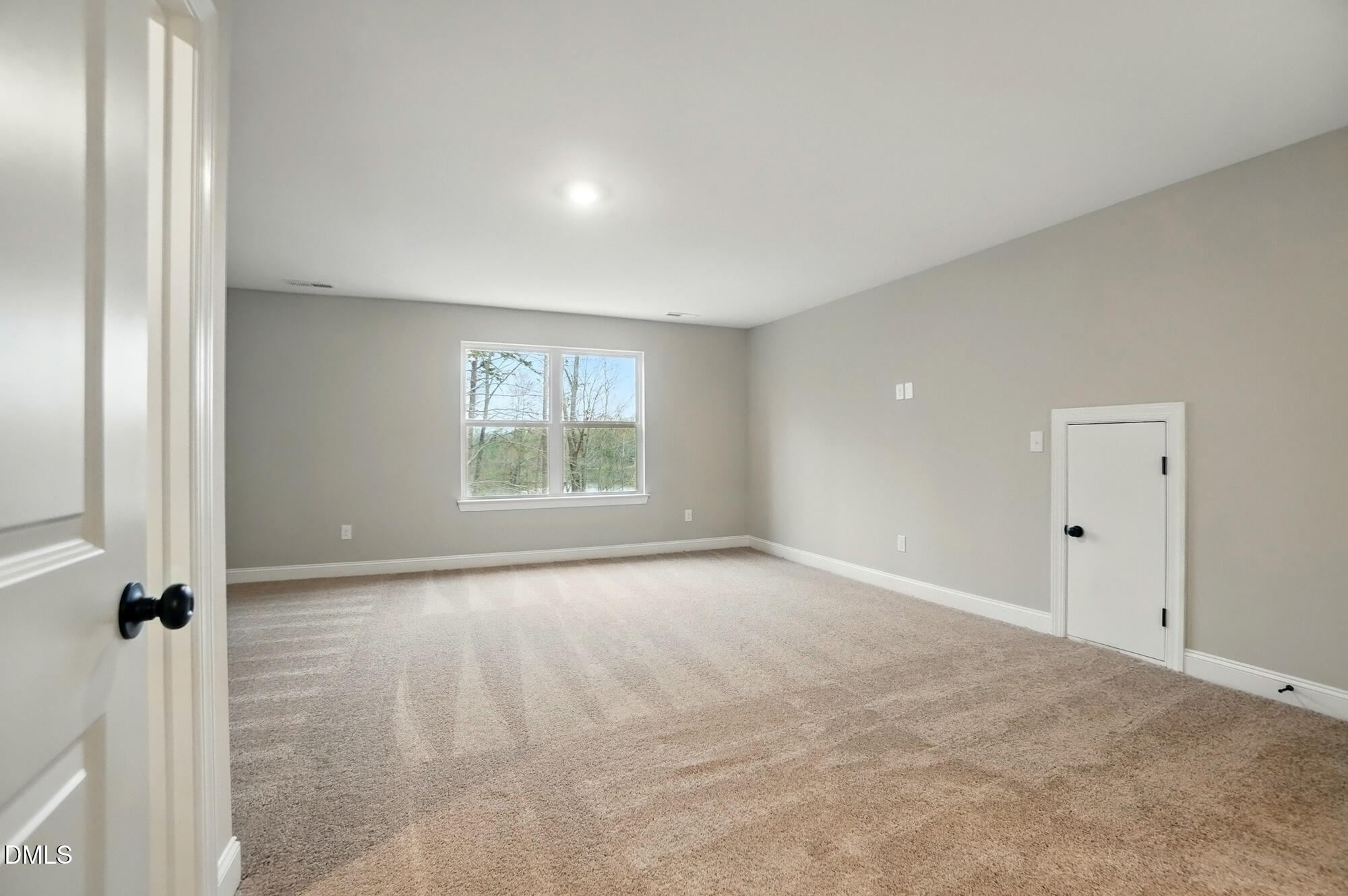 285 Gilliland Road Siler City, NC 27344 - Photo 32 of 45 a view of an empty room with a window