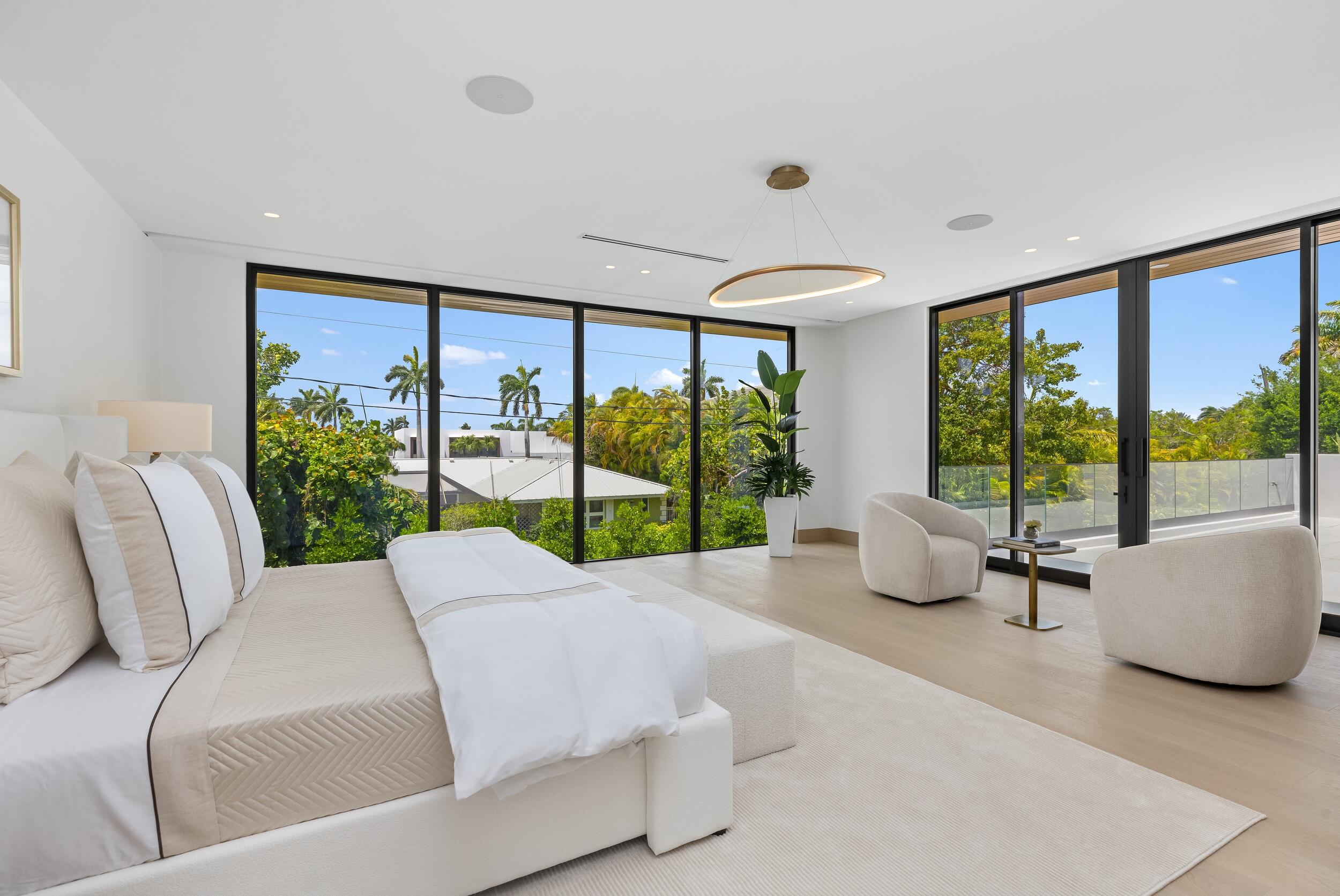 1351 Cocoanut Road Boca Raton, FL 33432 - Photo 62 of 101 a living room with furniture and large windows