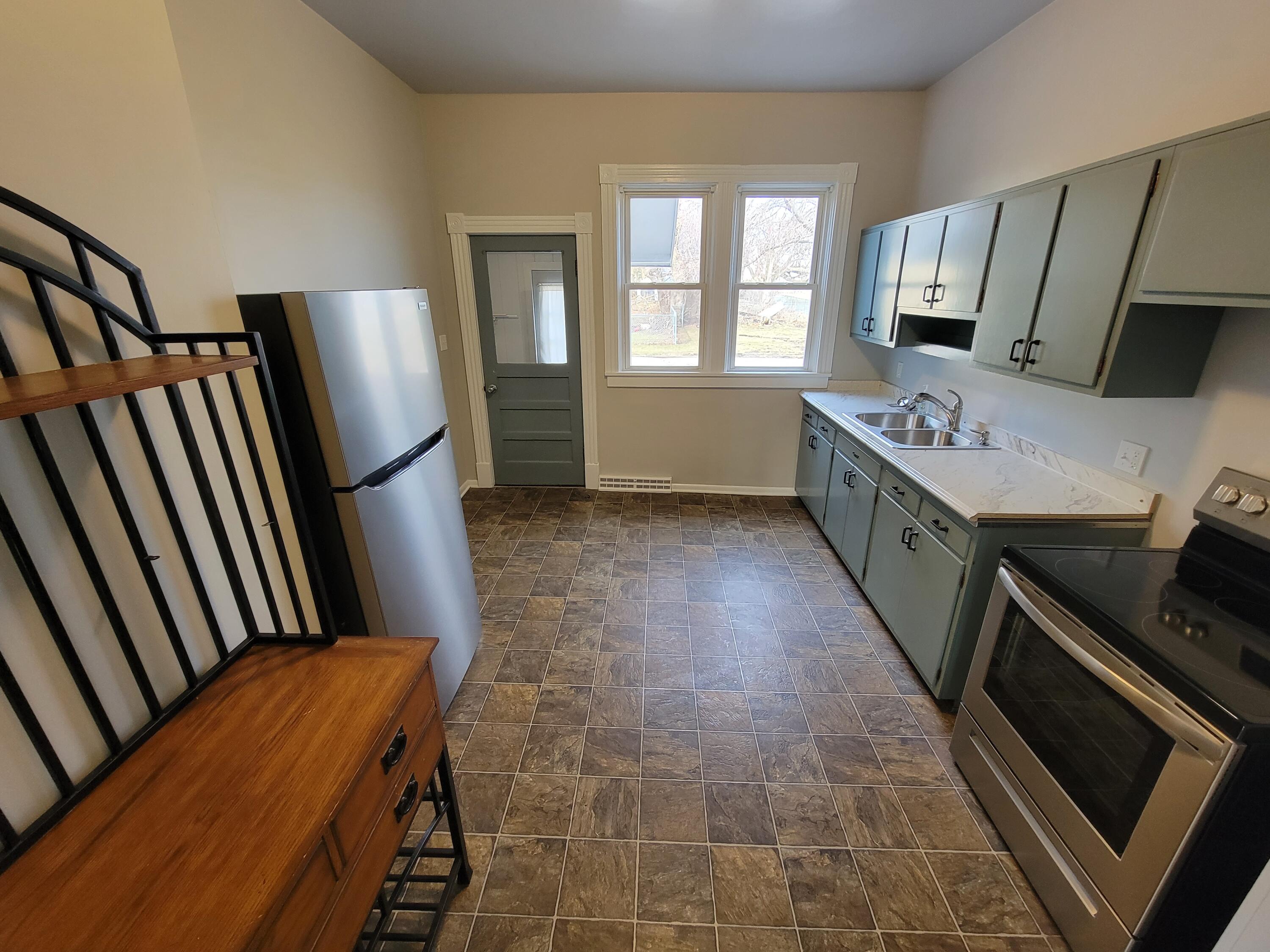 258 3rd Street Manistee, MI 49660 - Photo 4 of 26 20230220_142743 Kitchen (1)