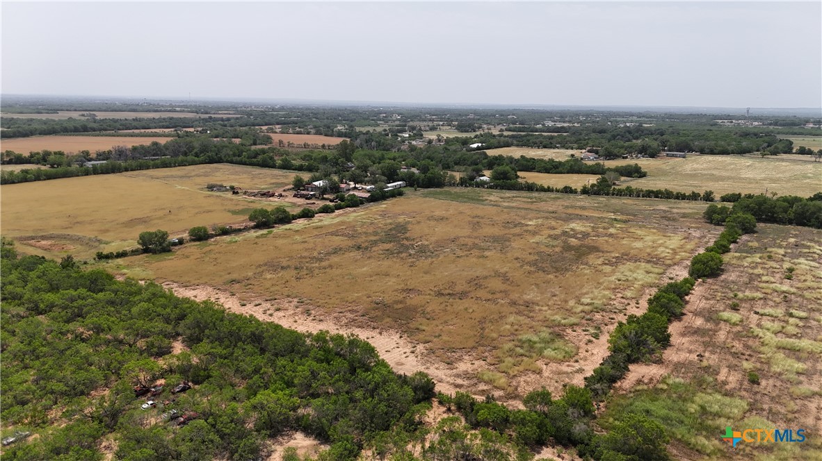 10945 Dillon Road Atascosa, TX 78002 - Photo 11 of 17 an aerial view of residential building and lake
