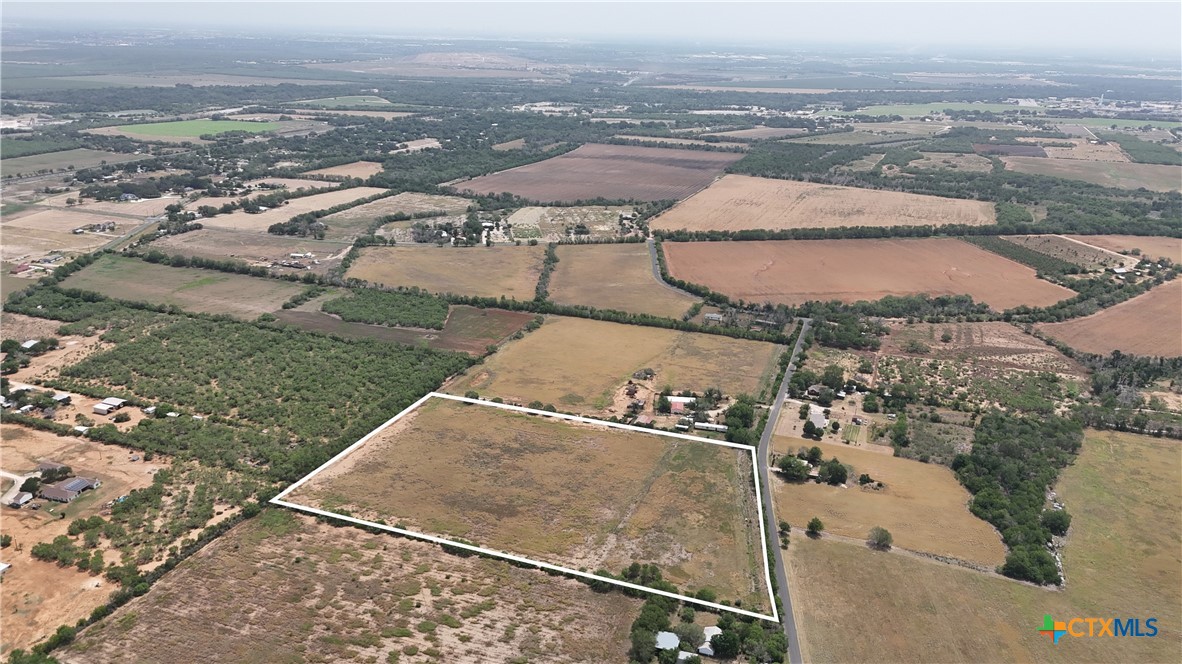 10945 Dillon Road Atascosa, TX 78002 - Photo 3 of 17 an aerial view of residential houses with outdoor space