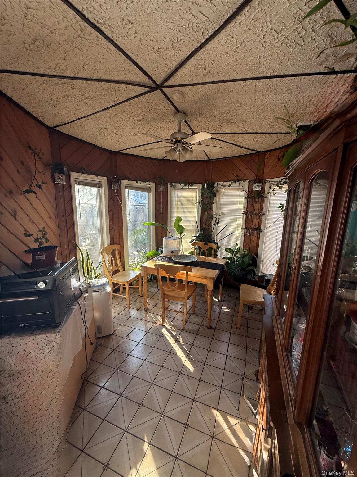Undisclosed Address West Babylon, NY 11704 - Photo 6 of 8 View of sunroom / solarium