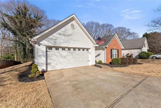 $379,900 | 5740 Rolling Meadow Lane, Flowery Branch, GA 30542