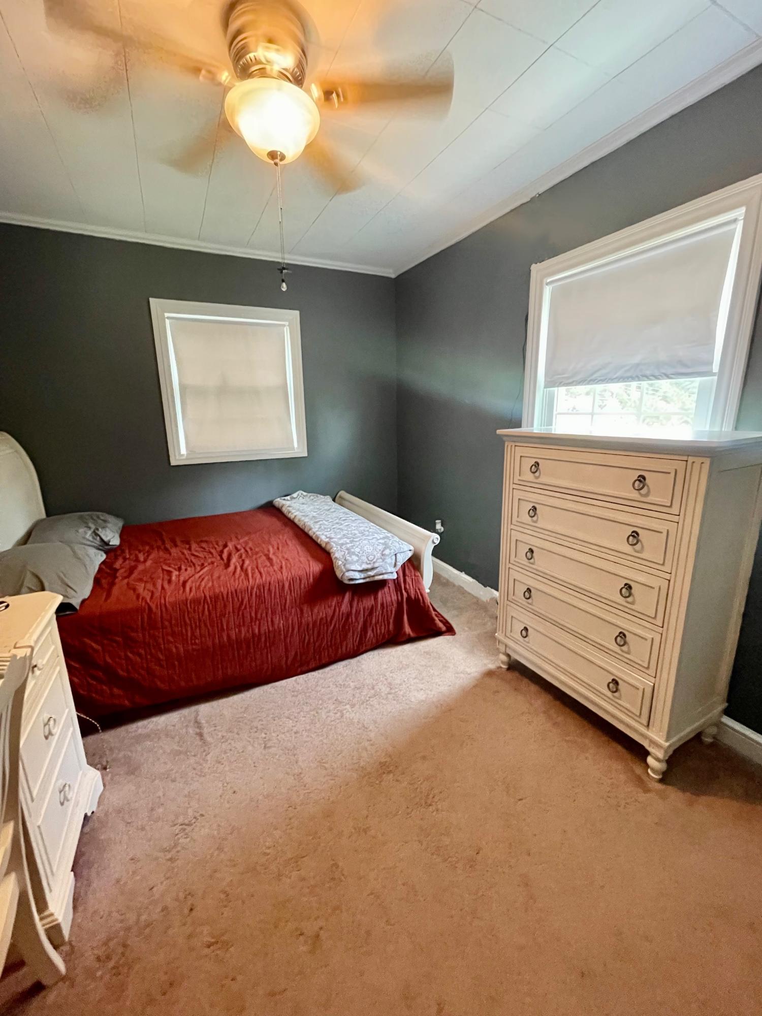 171 Oak Forest Road Bassett, VA 24055 - Photo 8 of 13 a bedroom with a bed and a cabinets