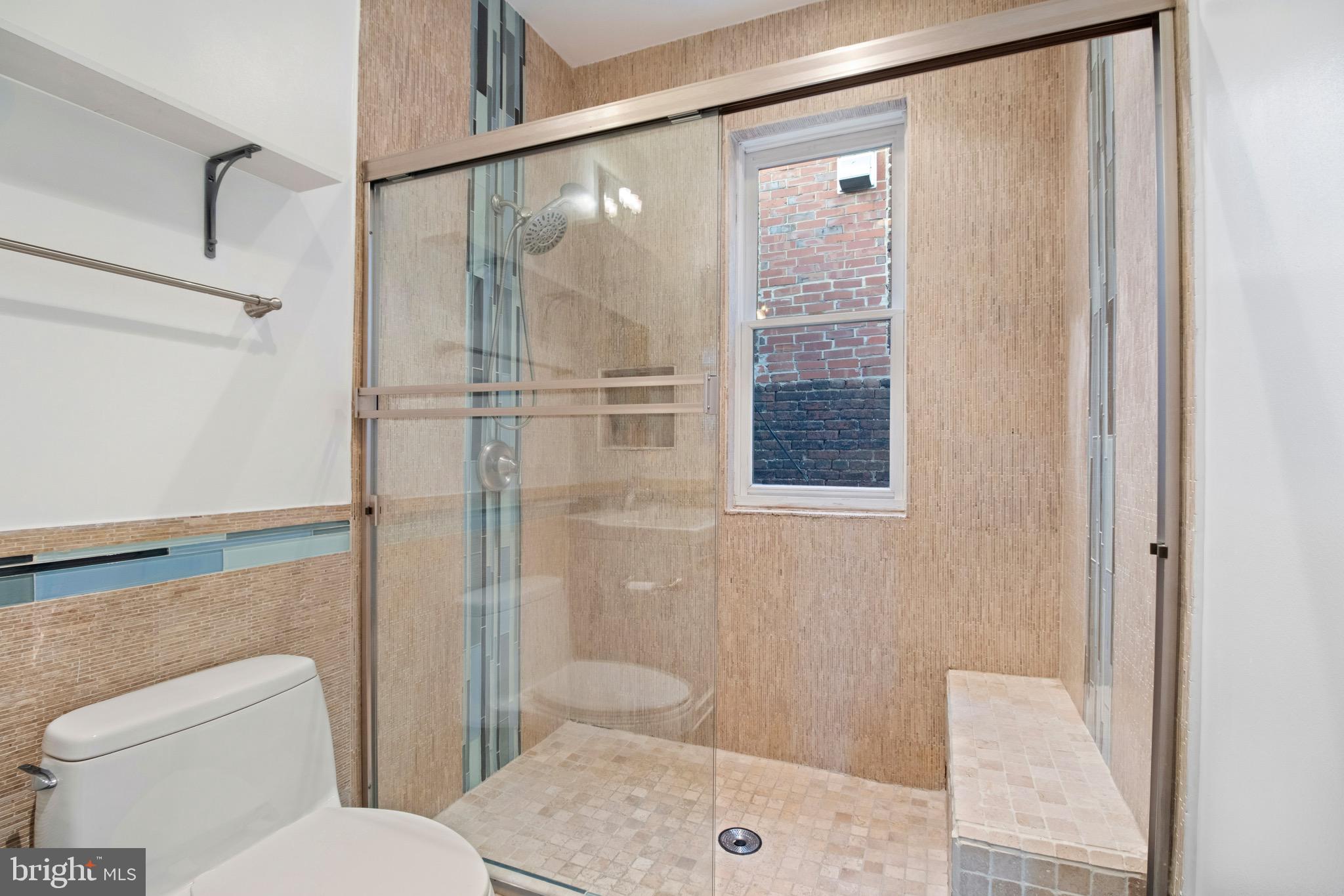 801 East Capitol Street Southeast Washington, DC 20003 - Photo 18 of 29 a bathroom with a toilet shower and a sink