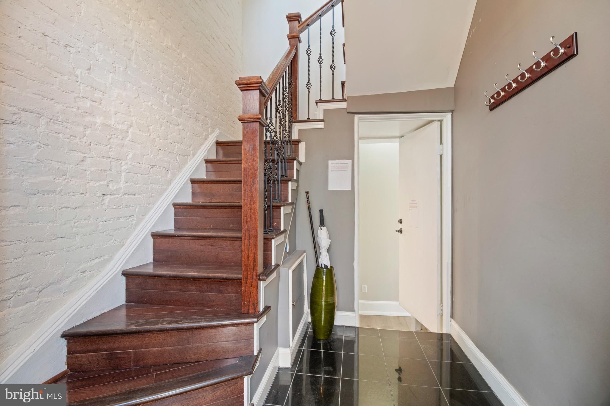 801 East Capitol Street Southeast Washington, DC 20003 - Photo 4 of 29 a view of entryway and gallery with wooden floor