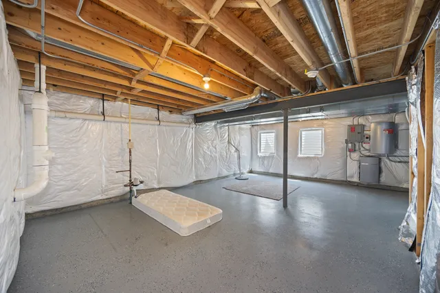 a view of a room with wooden walls