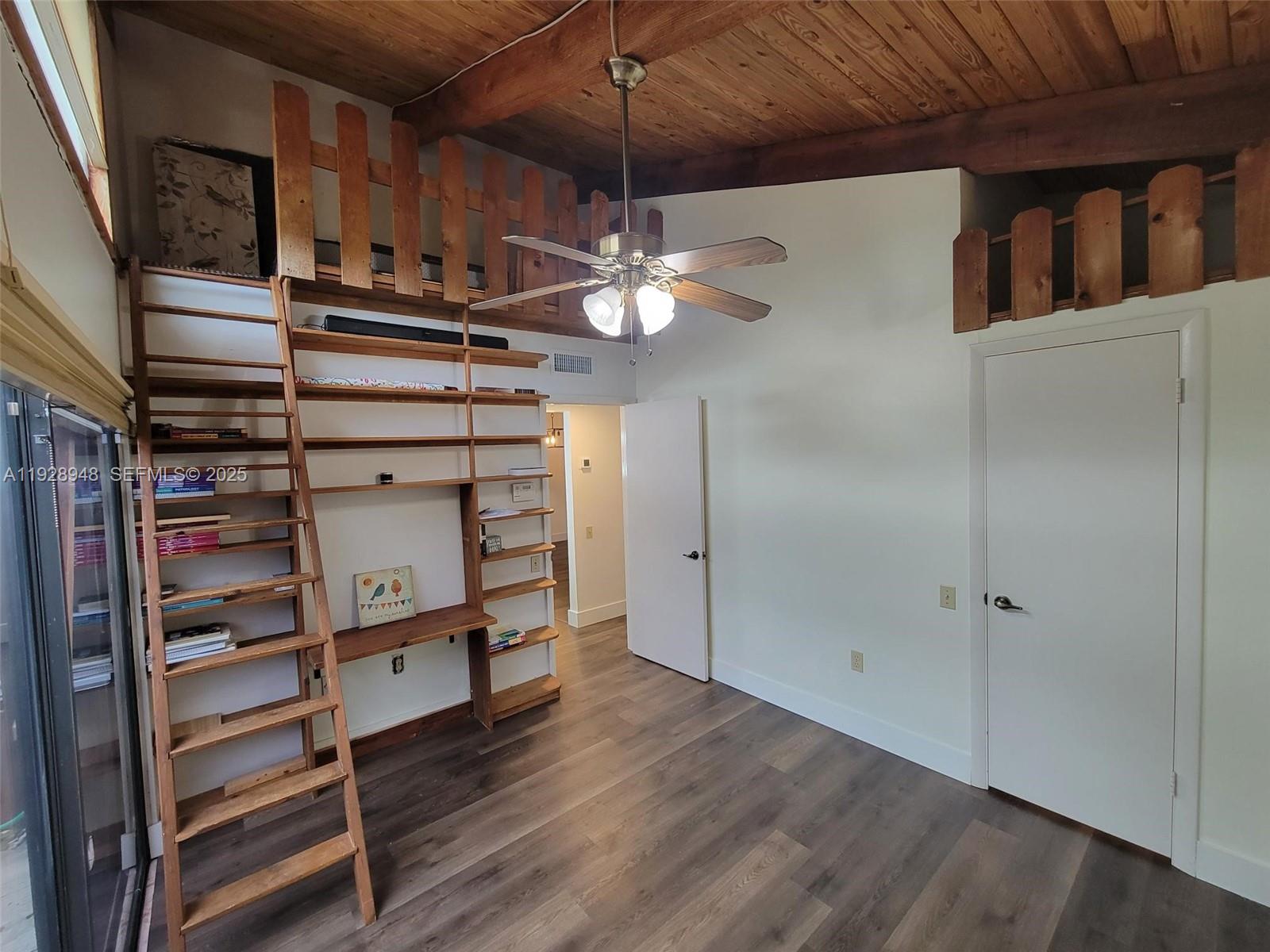 11375 Southwest 112th Cir Lane South Miami, FL 33176 - Photo 17 of 55 a view of walk in closet with empty racks