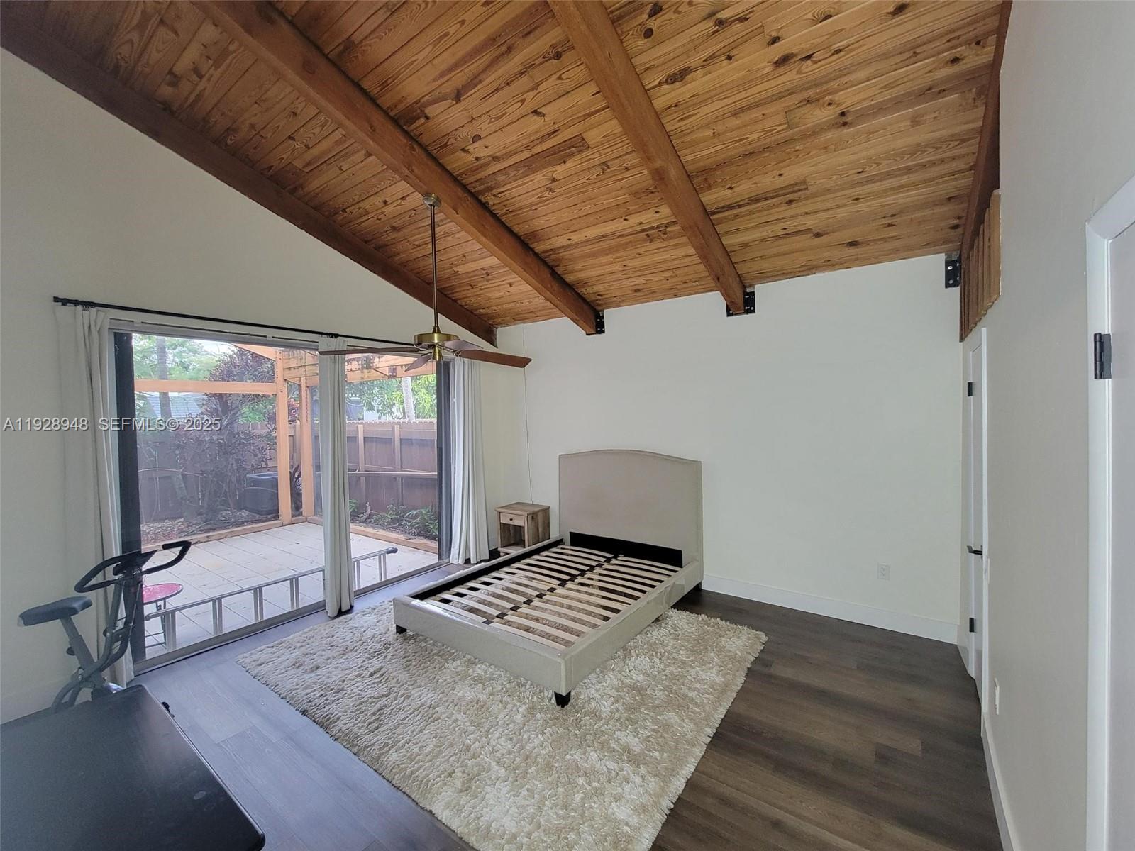 11375 Southwest 112th Cir Lane South Miami, FL 33176 - Photo 32 of 55 a living room with a couch next to a window