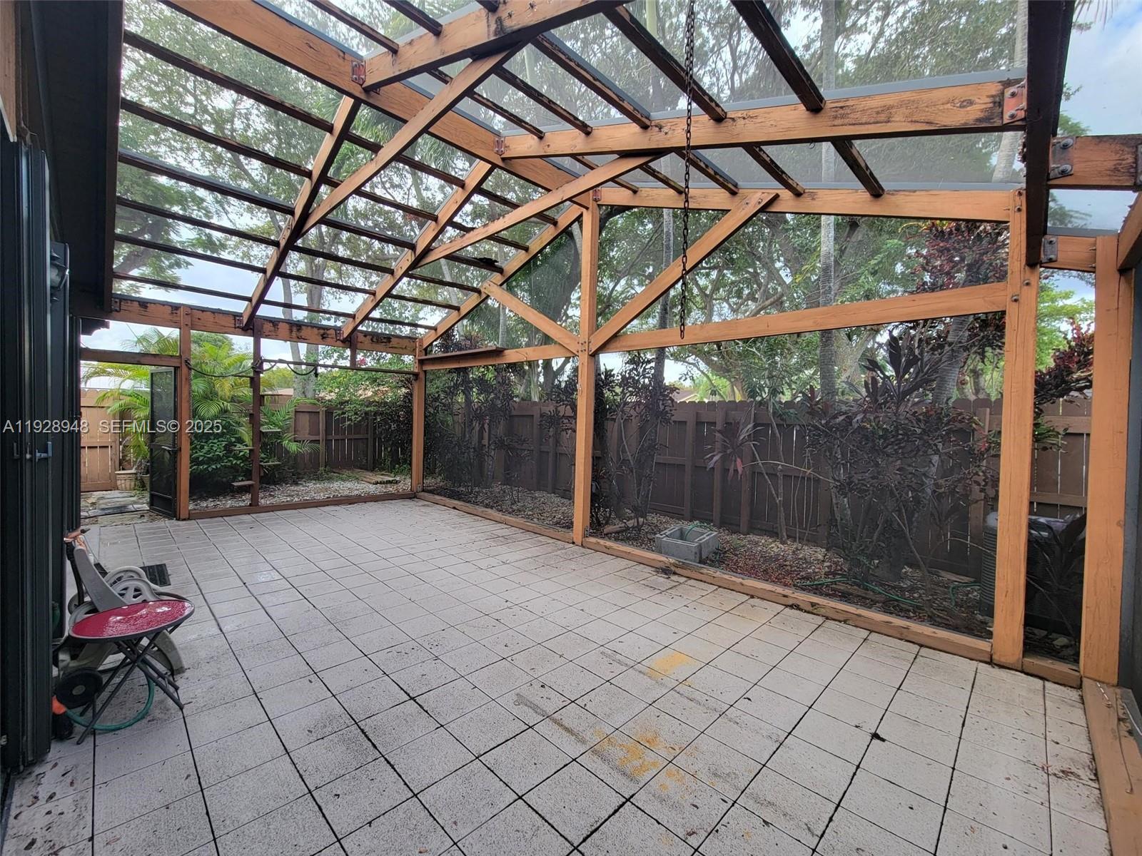 11375 Southwest 112th Cir Lane South Miami, FL 33176 - Photo 41 of 55 a view of a backyard