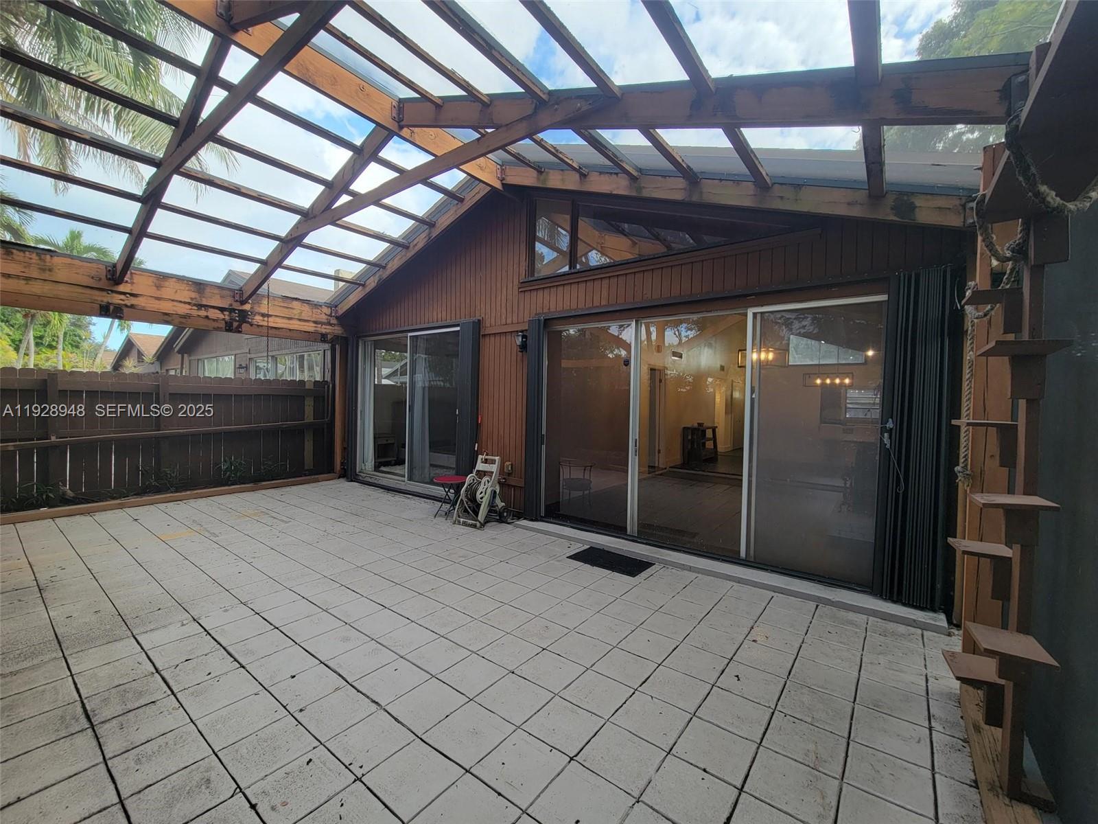 11375 Southwest 112th Cir Lane South Miami, FL 33176 - Photo 42 of 55 a view of a room with wooden floor