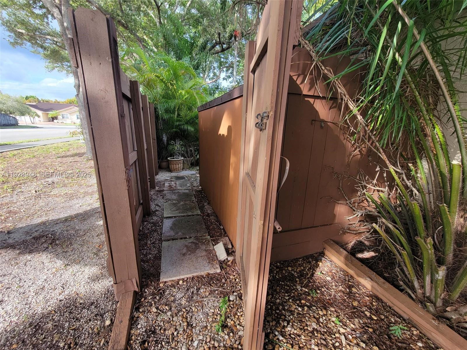 11375 Southwest 112th Cir Lane South Miami, FL 33176 - Photo 51 of 55 a view of a house with a yard
