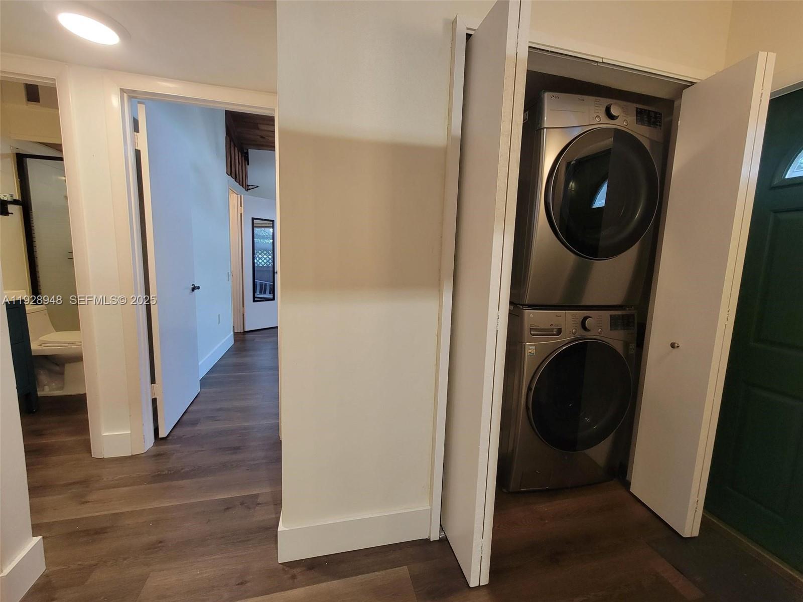 11375 Southwest 112th Cir Lane South Miami, FL 33176 - Photo 10 of 55 a view of a hallway with washer and dryer