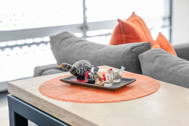 a stove top oven sitting inside of a kitchen
