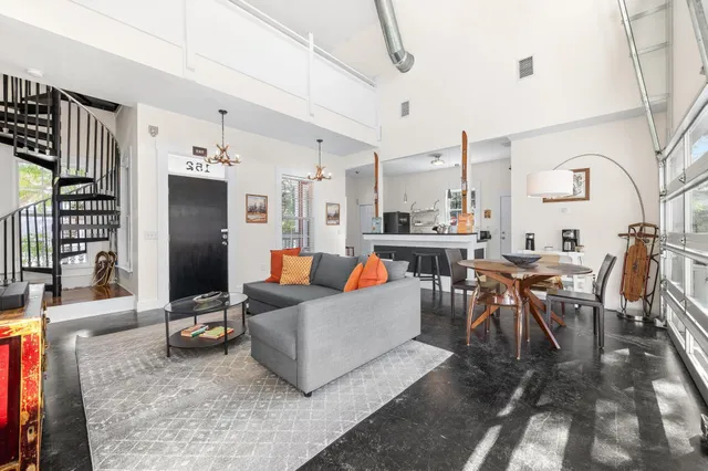 a kitchen with stainless steel appliances a sink and cabinets