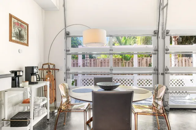 a spacious bedroom with a bed and a window