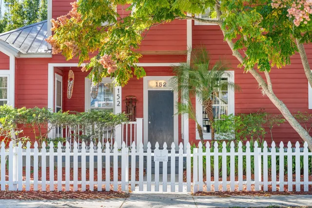 a balcony with wooden floor and outdoor space